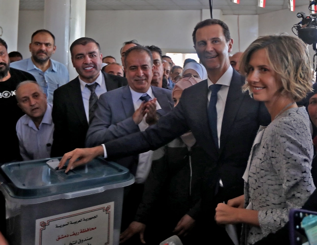 Syrians vote in election set to extend al-Assad’s grip on power